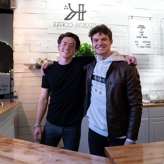 Aidan and William at their brick-and-mortar coffeeshop.